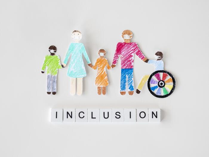 family-with-disables-person-cutout-paper-inclusion-concept.jpg